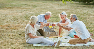 Retirees relaxing in the park in a mobile home community