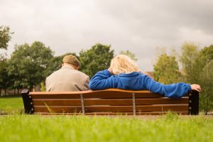 retirees in the park bench